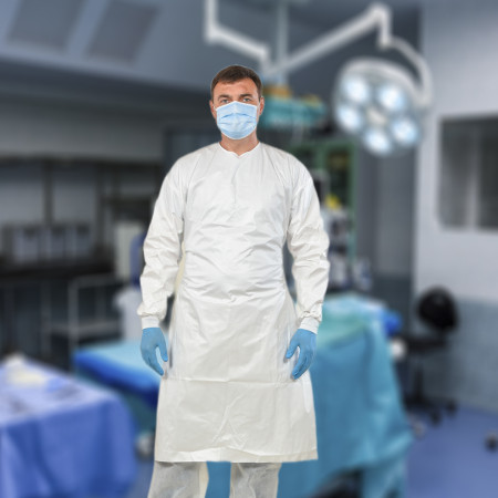 Disposable protective nonwoven gown with ties and belt